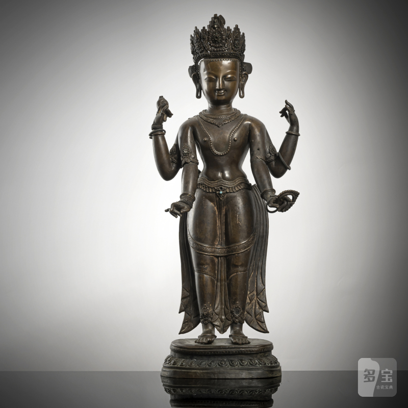 AN EMBOSSED COPPER FIGURE OF VISHNU